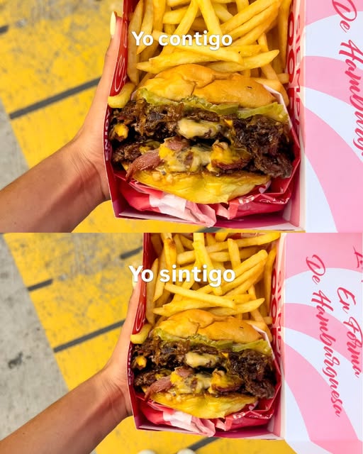 Dos cajas de hamburguesa con papas sobre papel de Foodies